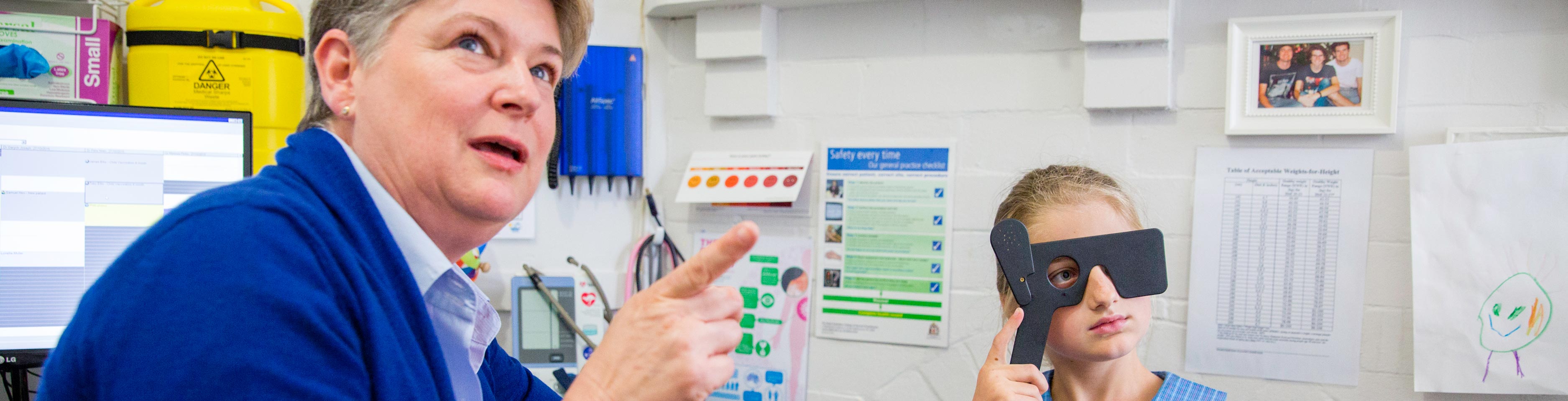 Young girl does eye test