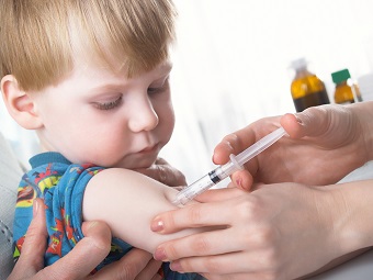 Young boy receiving vaccination