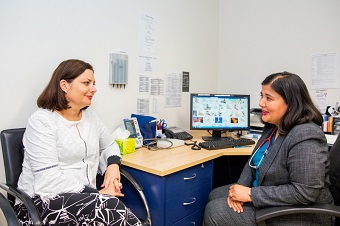 Lady in consult with GP