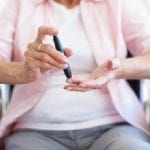 Older woman with insulin device